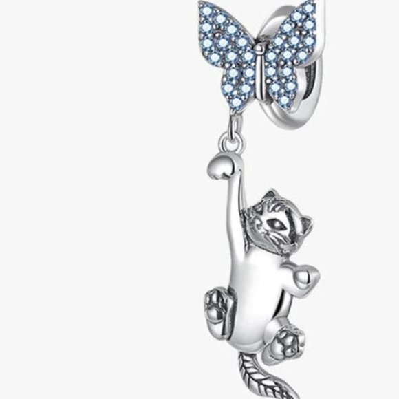 Other - 💜 Sterling Silver Kitty Cat Hanging from Butterfly Charm